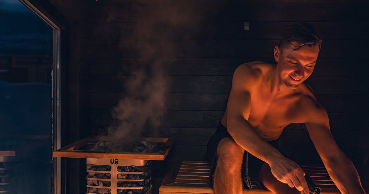 Person immersed in a cold plunge recovery tub