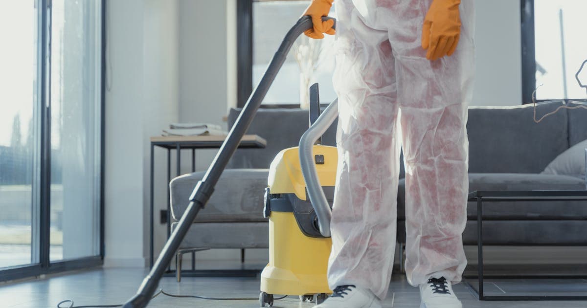 Technician repairing a residential garage door