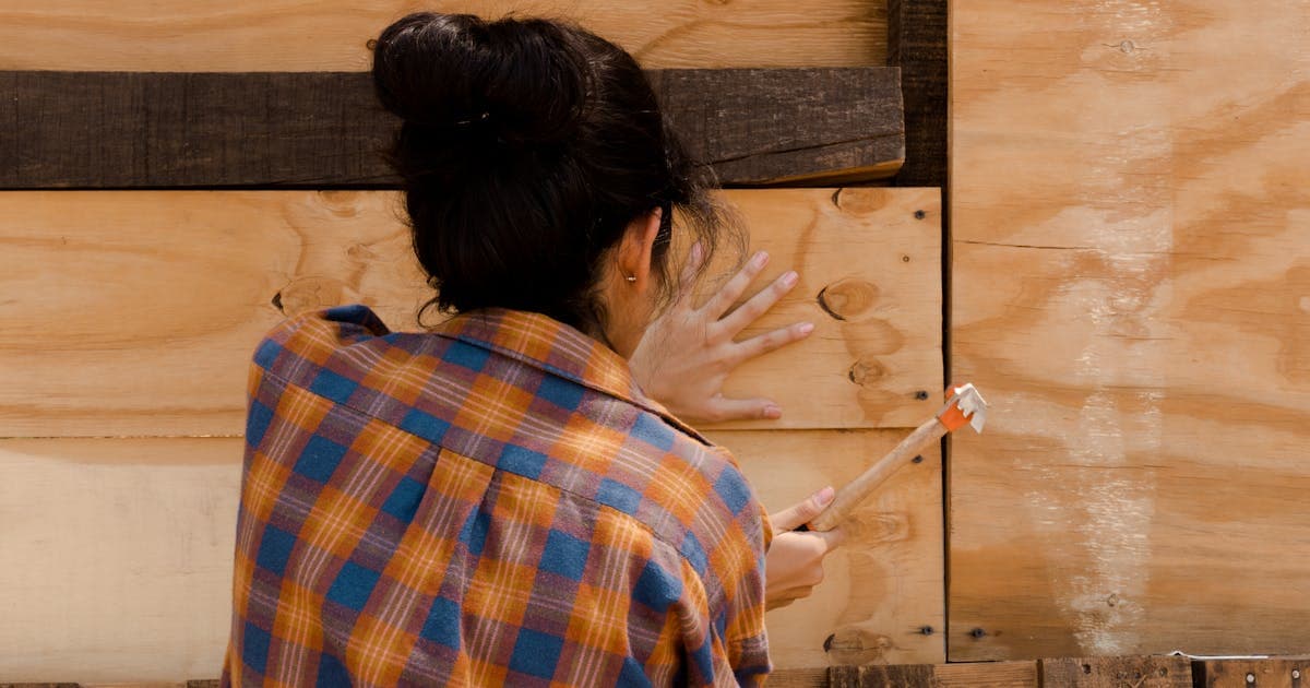 HVAC technician servicing an air conditioning unit